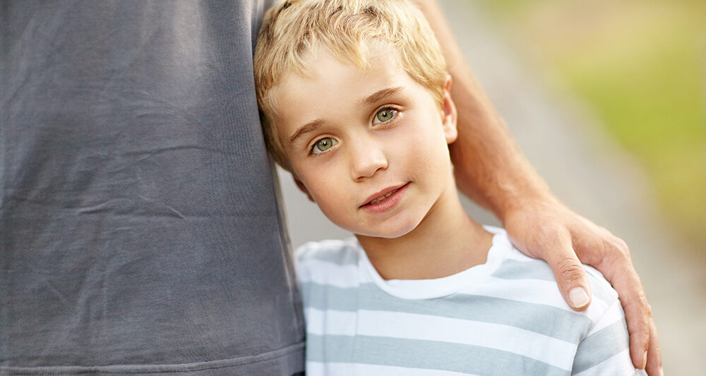Daddys boy. A cute little boy with his father