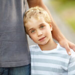 Daddys boy. A cute little boy with his father